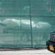 Workers removing a body from a refrigerated truck serving as a temporary morgue at the Brooklyn Hospital Center in New York City.